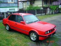 BMW e30 sedan red
